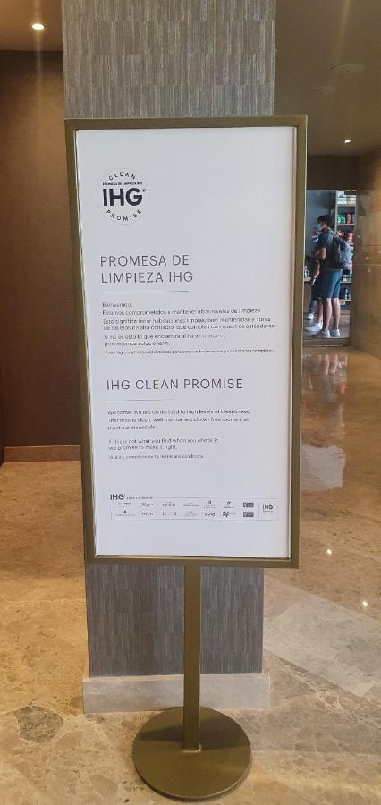Hotel Intercontinental Cali By Ihg Exterior photo IHG Clean Promise sign at the InterContinental Madrid