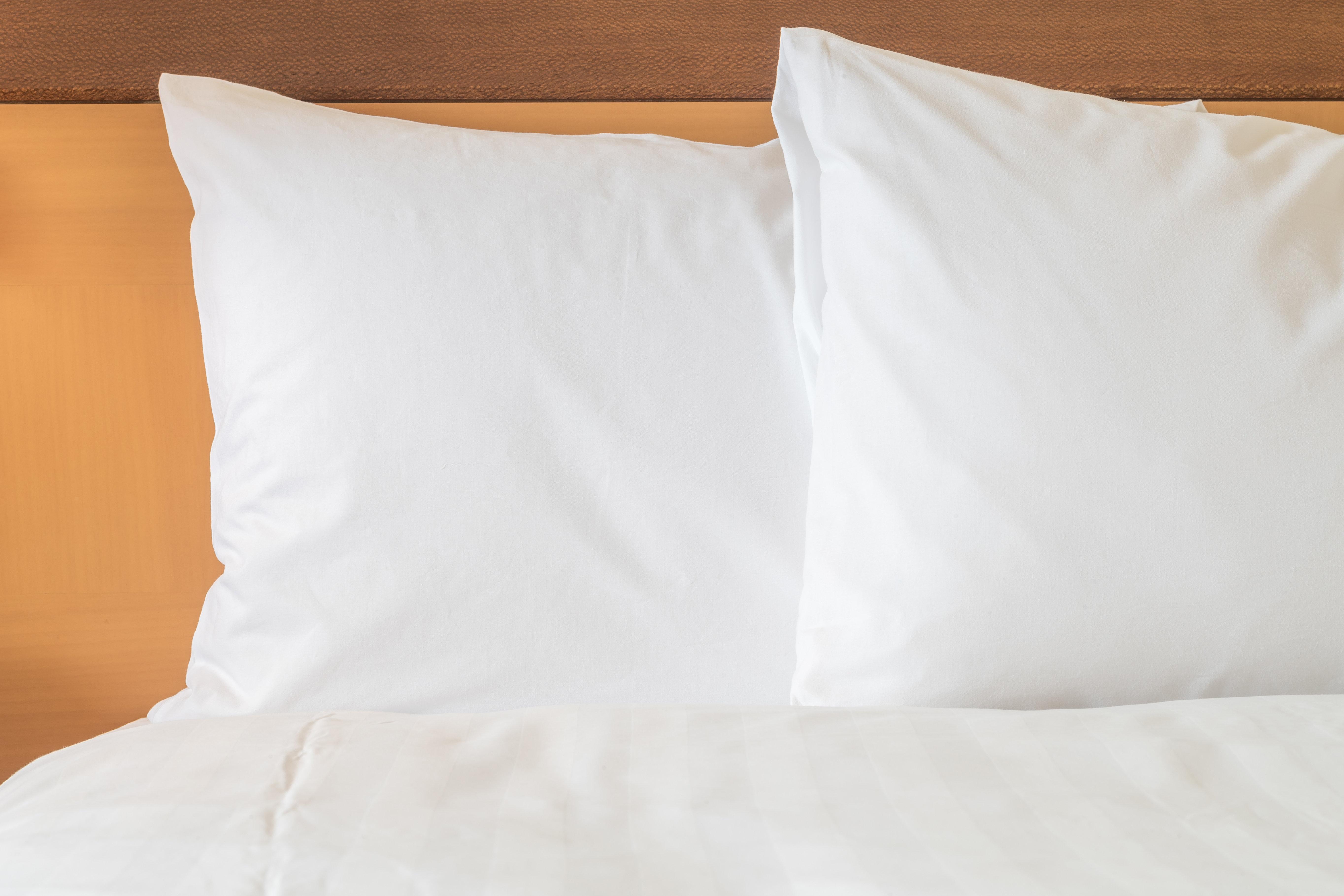 Hotel Intercontinental Cali By Ihg Exterior photo Two pillows on a bed
